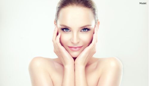 beautiful-young-woman-with-clean-fresh-skin-touching-her-face-img-blog-compressor